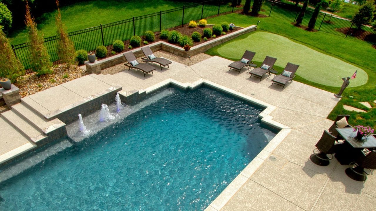 Rectangular Pool with a Protective Safety Pool Fence by The Pool Specialists