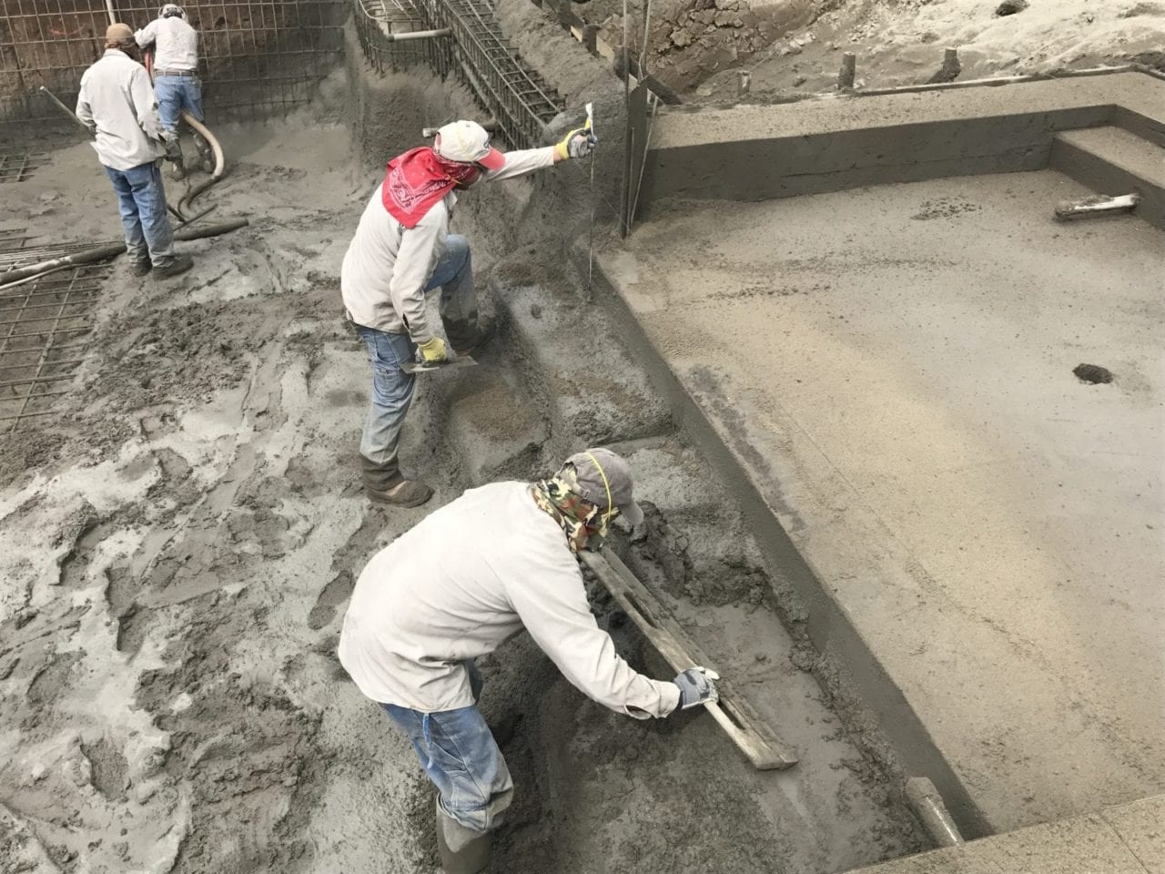 Applying Concrete Gunite to the Steel Rebar to Form the Pool Walls by The Pool Specialists